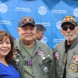 Military soldier saluting American flag