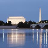 Monuments and Potomac River at night